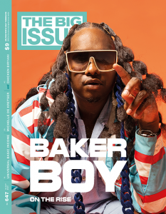 Baker Boy on the cover of our latest edition, wearing classes and a felt covered blue chain.